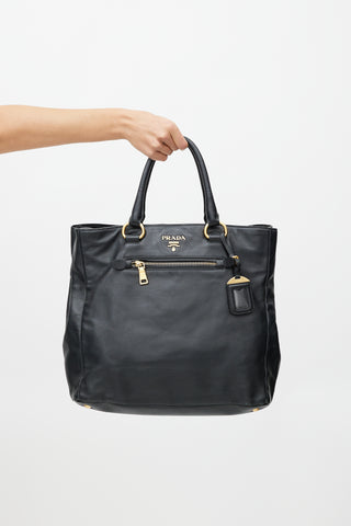 Prada Black 
Gold Leather Tote