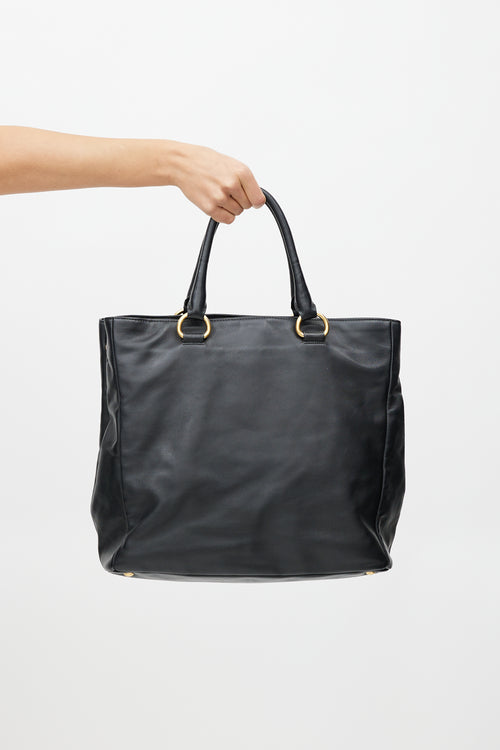 Prada Black 
Gold Leather Tote