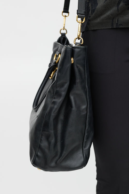 Prada Black 
Gold Leather Tote