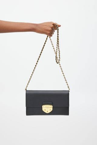 Prada Black 
Gold Saffiano Lux Bandoliera Bag