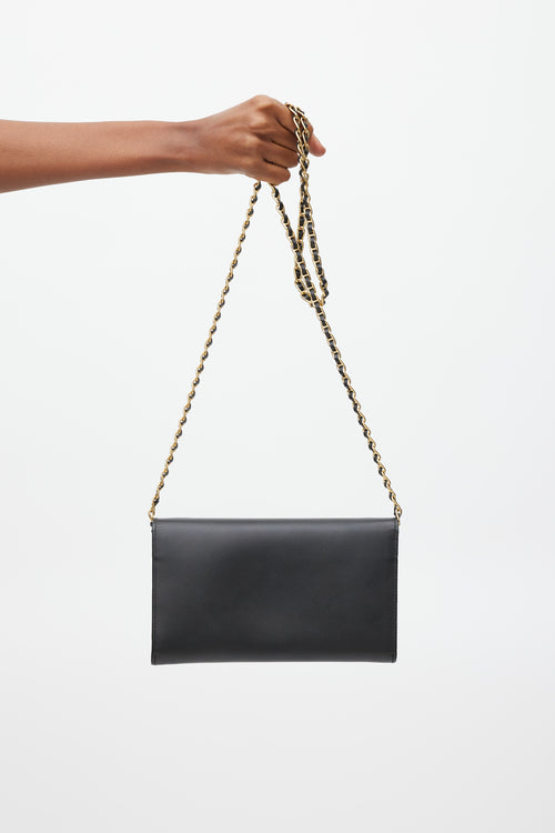 Prada Black 
Gold Saffiano Lux Bandoliera Bag