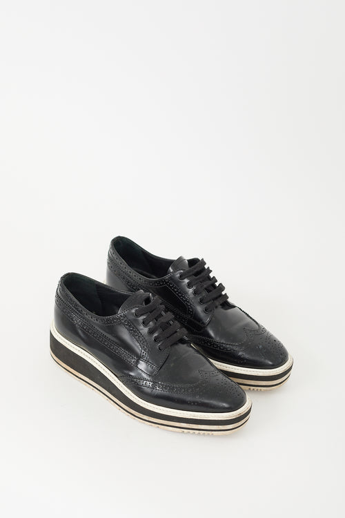 Prada Black 
White Leather Brogue Platform Oxford