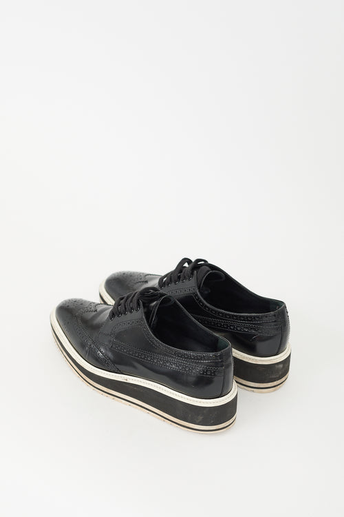 Prada Black 
White Leather Brogue Platform Oxford