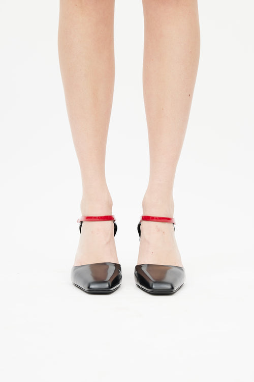 Prada Black 
Red Patent Pump