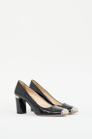 Prada Black 
Silver Patent Leather Pump