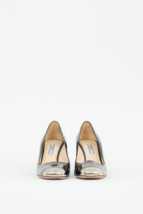 Prada Black 
Silver Patent Leather Pump