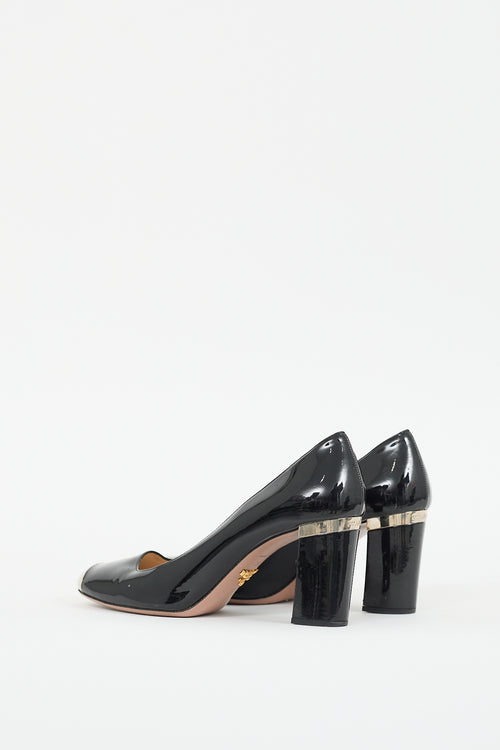 Prada Black 
Silver Patent Leather Pump