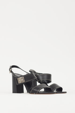 Prada Black 
Silver Turn Lock Leather Heel