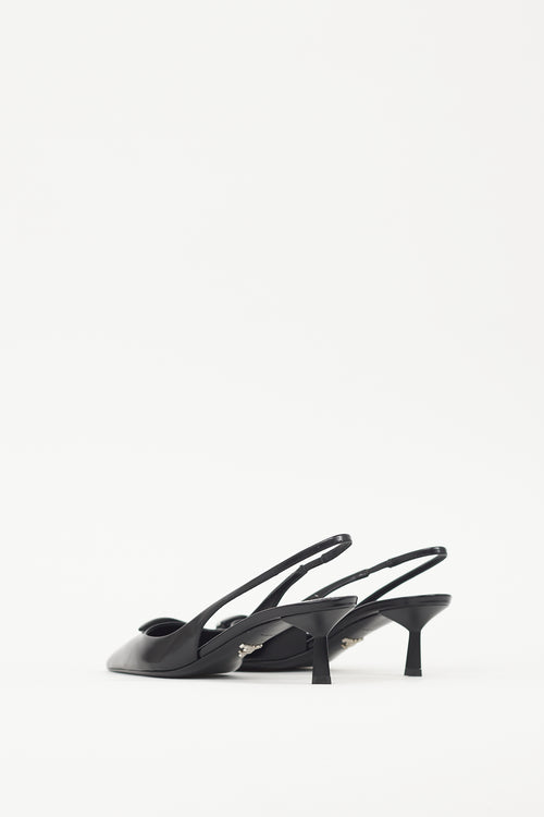 Prada Black 
White Leather Logo Mule