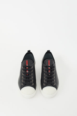 Prada Black 
White Leather Low Top Sneaker