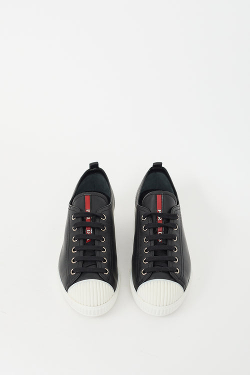 Prada Black 
White Leather Low Top Sneaker