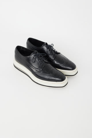 Prada Black 
White Leather Brogue Platform Oxford