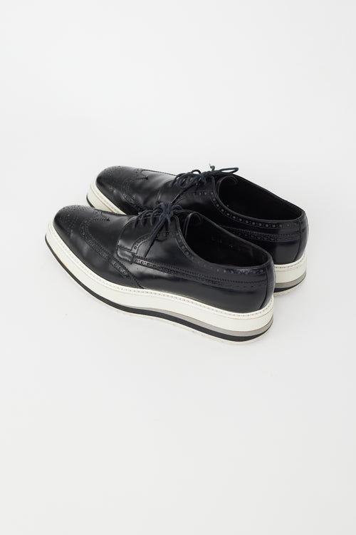 Prada Black 
White Leather Brogue Platform Oxford