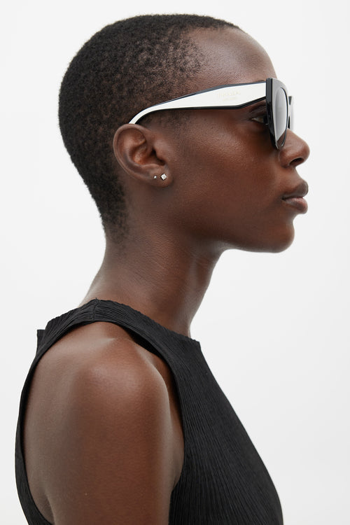 Prada Black 
White SPR14W Sunglasses