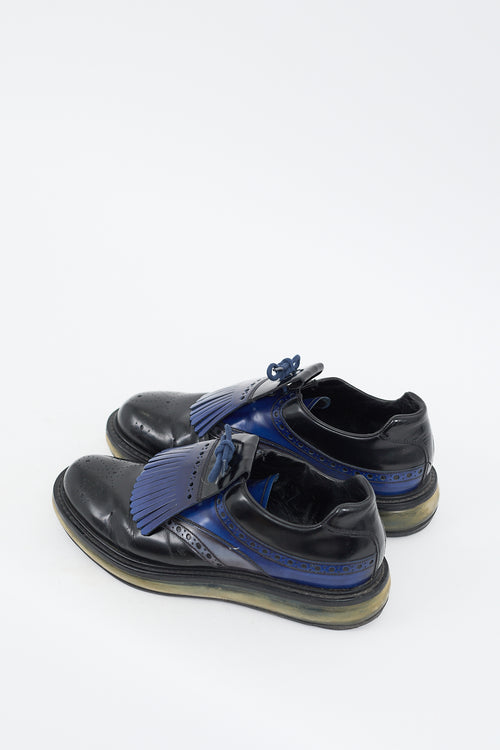 Prada Black 
Blue Leather Levitate Fringed Brogue