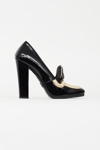 Prada Black 
Cream Patent Leather Pump