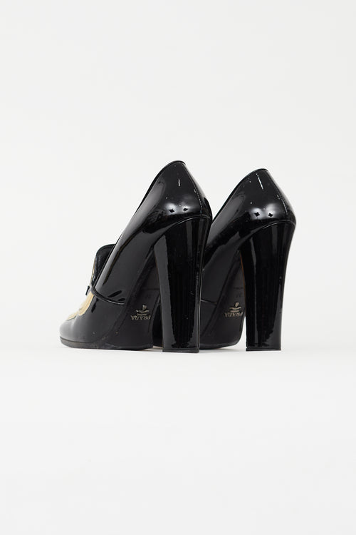 Prada Black 
Cream Patent Leather Pump