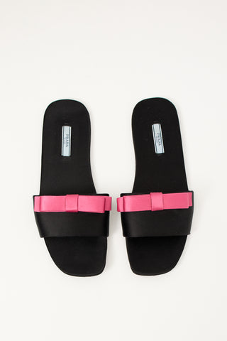 Prada Black 
Pink Satin Bow Slide