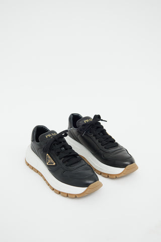 Prada Black 
Brown Prax Leather Sneaker