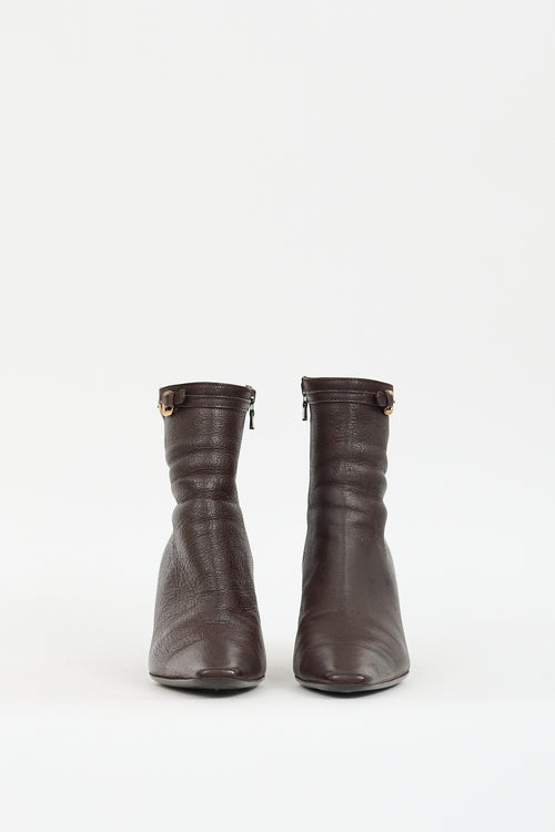 Prada Brown Leather 
Gold Buckle Boot