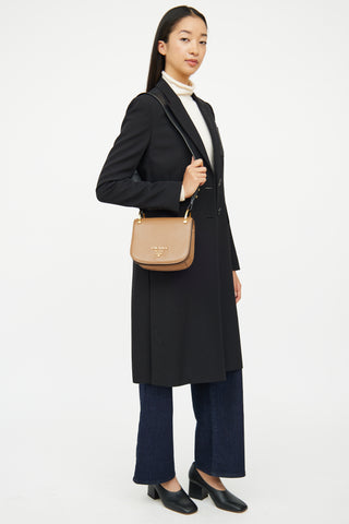 Prada Brown 
Black Pionniere Saddle Bag