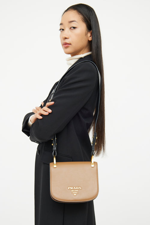 Prada Brown 
Black Pionniere Saddle Bag