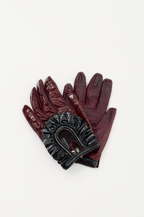 Prada Burgundy 
Black Patent Cut Out Gloves