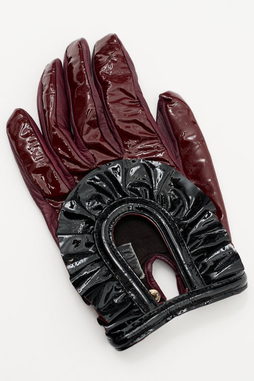 Prada Burgundy 
Black Patent Cut Out Gloves