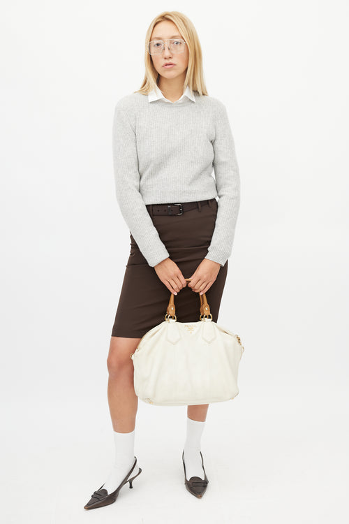 Prada Cream Pebbled Leather Duffle Bag