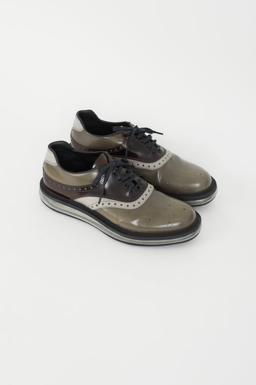 Prada Grey 
Black Patent Transparent Sole Oxford