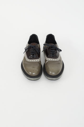 Prada Grey 
Black Patent Transparent Sole Oxford