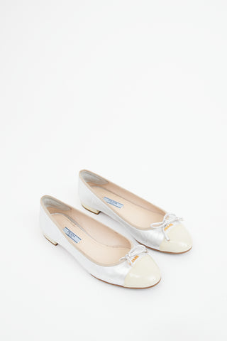 Prada Silver 
Cream Cap Toe Ballet Flat