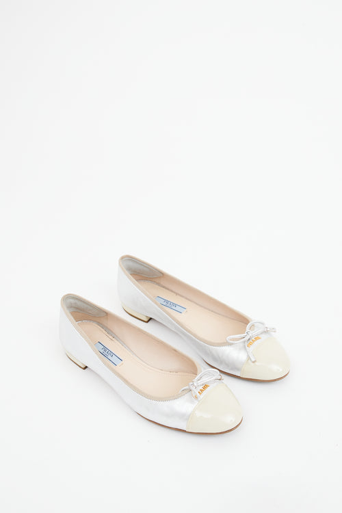 Prada Silver 
Cream Cap Toe Ballet Flat