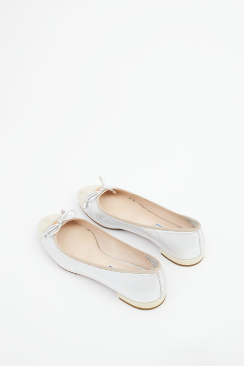 Prada Silver 
Cream Cap Toe Ballet Flat