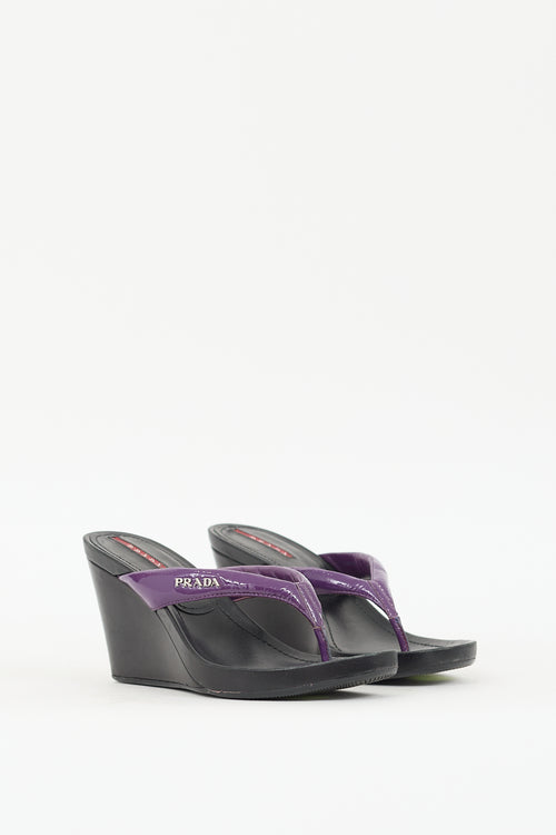 Prada Sport Purple 
Black Patent Leather Wedge Sandal