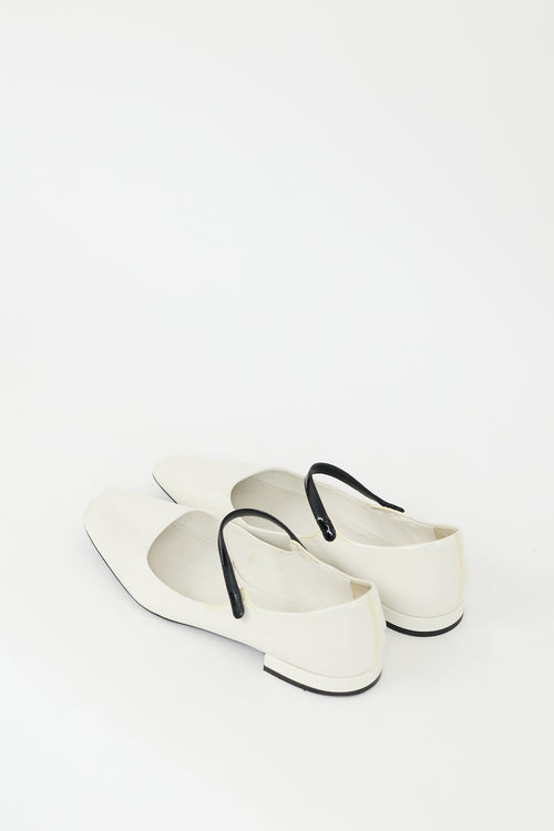 Prada White 
Black Leather Mary Jane Flat