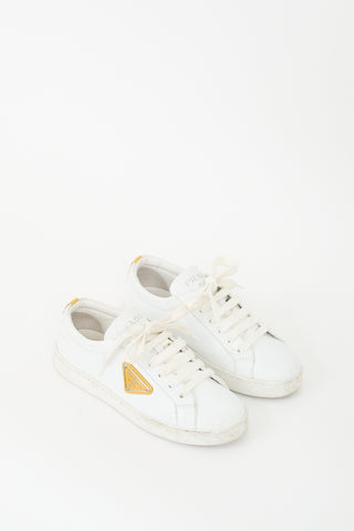 Prada White Leather 
Yellow Plaque Logo Sneaker