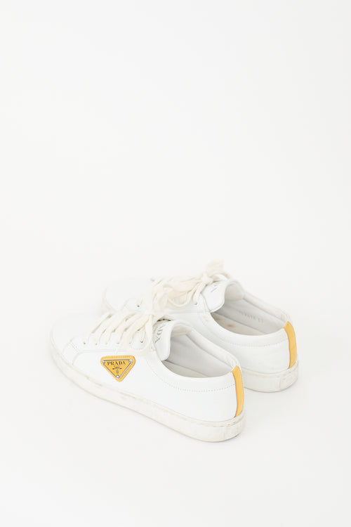 Prada White Leather 
Yellow Plaque Logo Sneaker