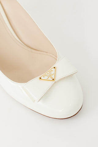 Prada White Patent Leather Plaque Bow Pump