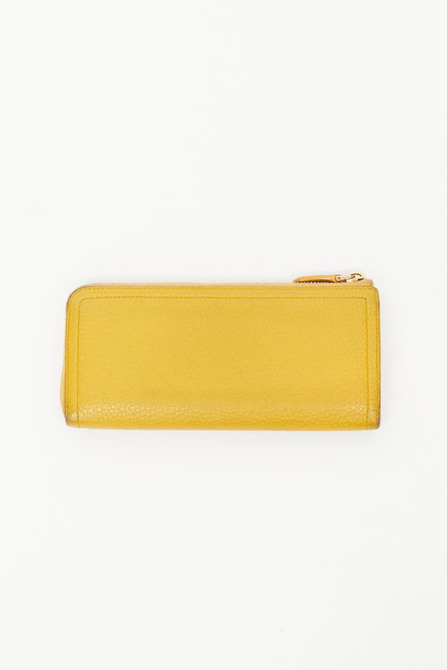 Prada Yellow Pebbled Leather Zip Wallet