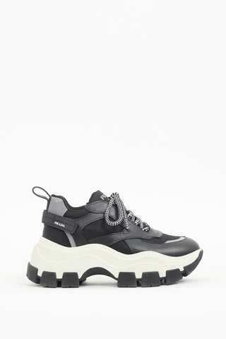 Prada Black 
White Leather Pegasus Sneaker