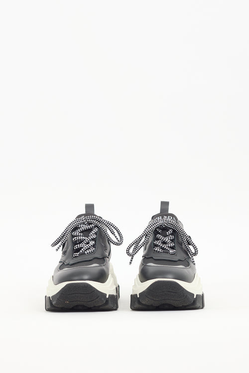 Prada Black 
White Leather Pegasus Sneaker