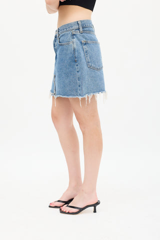 Re/Done Medium Wash Denim Raw Hem Mini Skirt