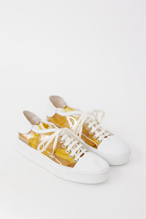 Rocco P. White Leather 
Yellow PVC Feather Sneaker