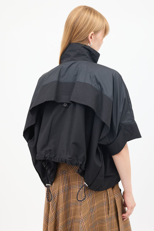 Sacai Black Cotton 
Nylon Panelled Short Sleeve Cape Jacket