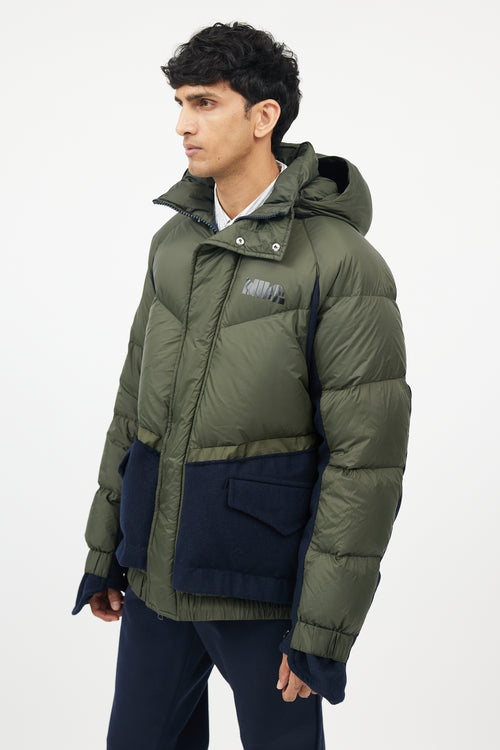 Sacai X Nike Green 
Navy Down Puffer