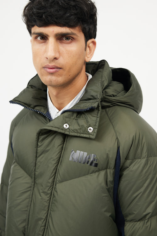 Sacai X Nike Green 
Navy Down Puffer