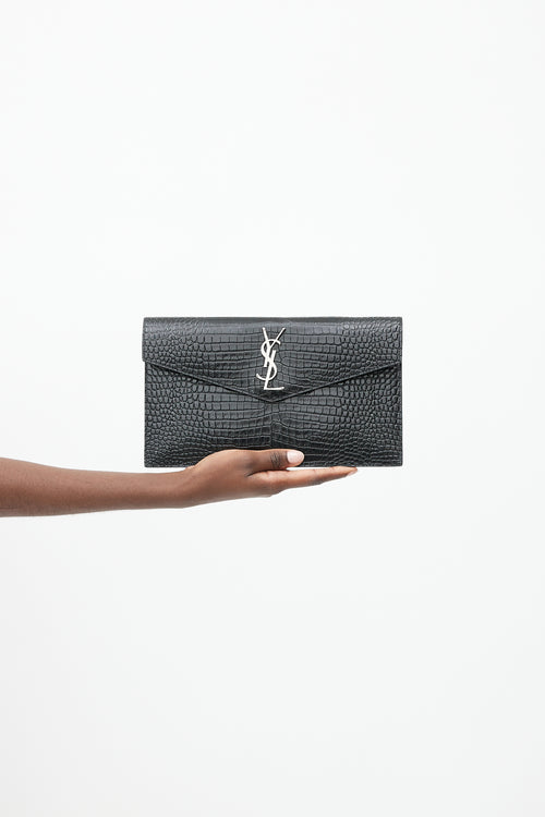 Saint Laurent 2019 Black 
Silver Embossed Leather Uptown Clutch