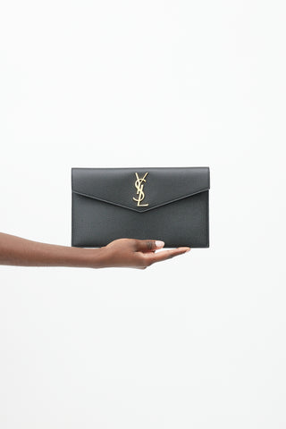 Saint Laurent 2020 Black 
Gold Grained Leather Uptown Clutch