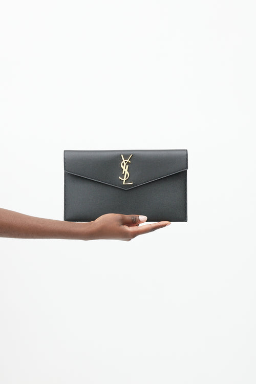 Saint Laurent 2020 Black 
Gold Grained Leather Uptown Clutch